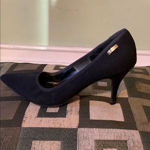 Black Calvin Klein pumps (material)